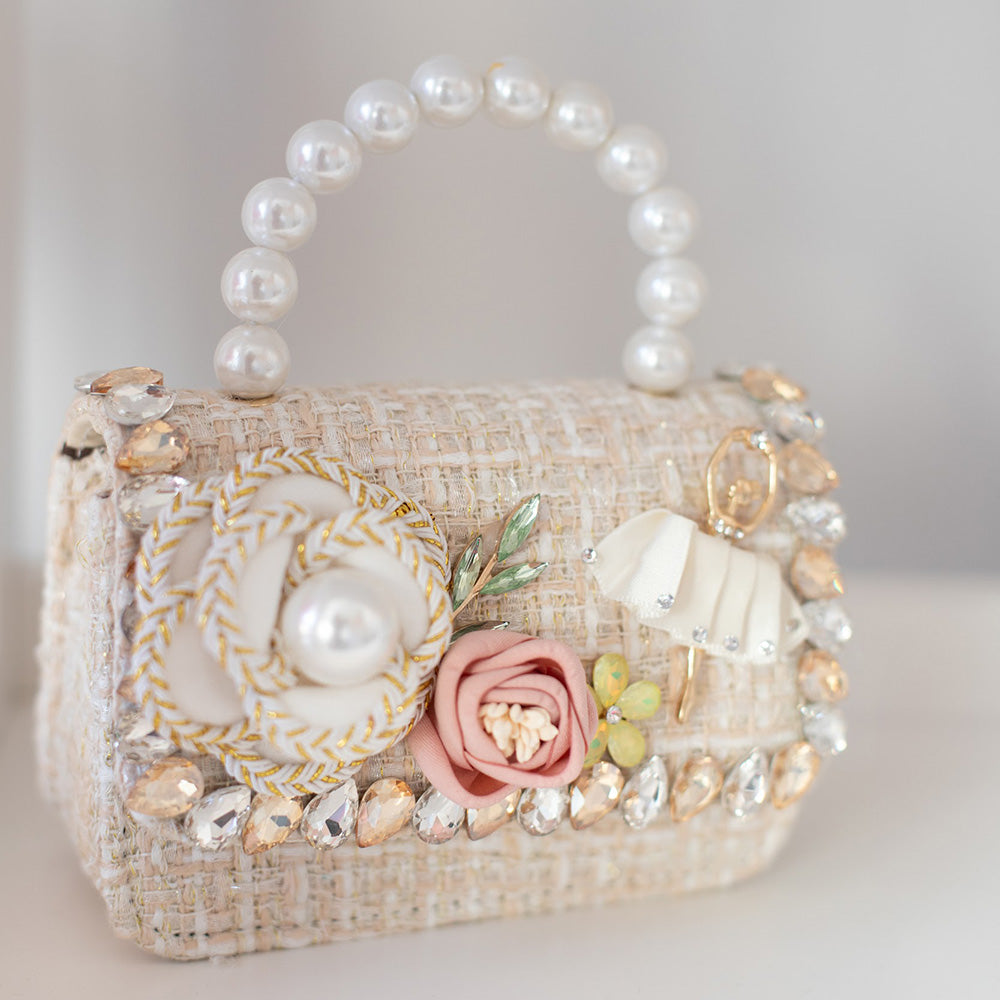 Grezna bērnu rokassomiņa gaiša