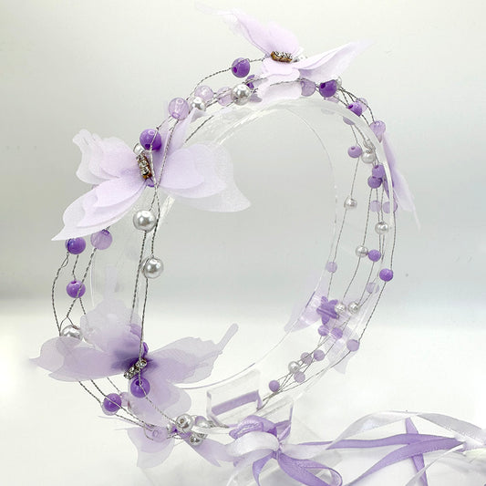 Matu rota ar tauriņiem violeta